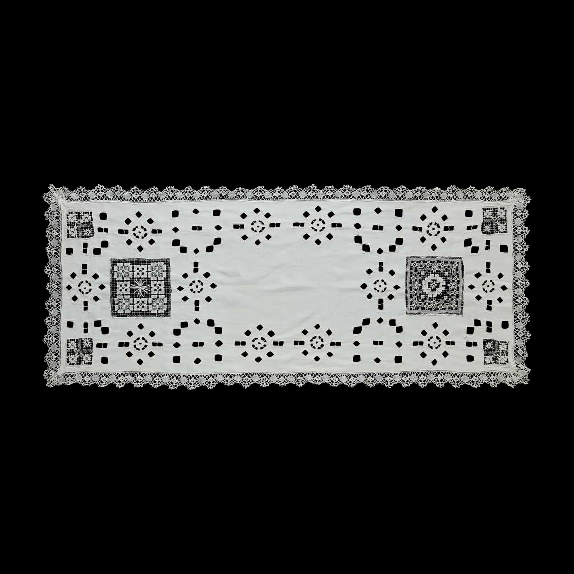 White linen table runner with lace and openwork embroidery, handcrafted in Portugal.