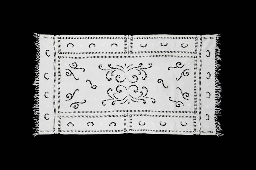 Centenary white linen tablecloth with crochet trim, lace inserts, and openwork.